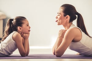 child imitating mother